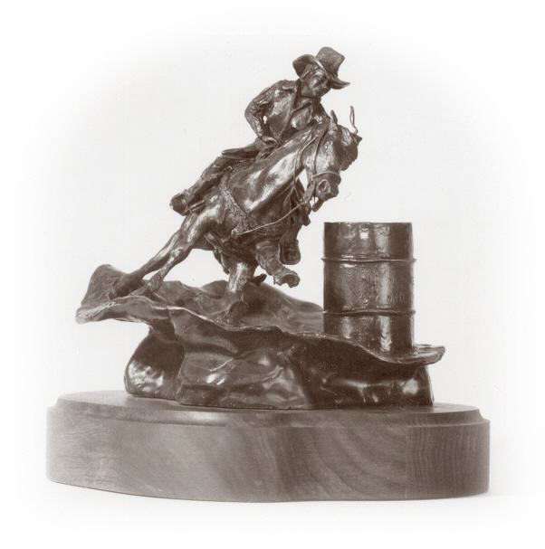 Bronze sculpture of barrel racer.