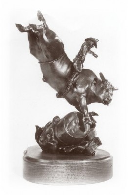 Bronze sculpture of bull rider.