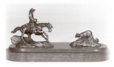 Bronze sculpture of a cutting horse.