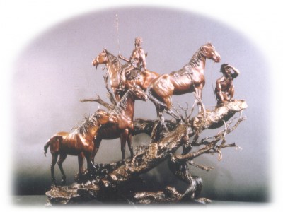 Bronze sculpture of Native Americans, horses on the lookout in enemy territory.