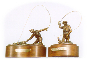 Bronze sculptures of fly fishermen.