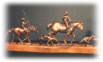 Bronze sculpture of children, horses, dogs going fishing.
