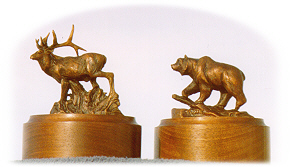 Bronze sculpture of elk and grizzly