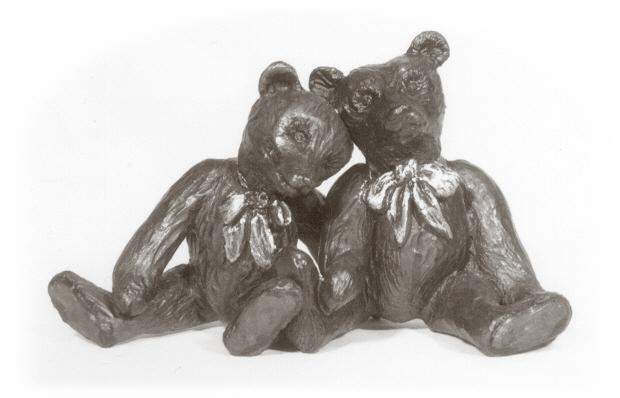 Bronze sculptures of teddy bears.