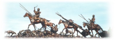 Bronze sculpture of Native Americans trailing home.