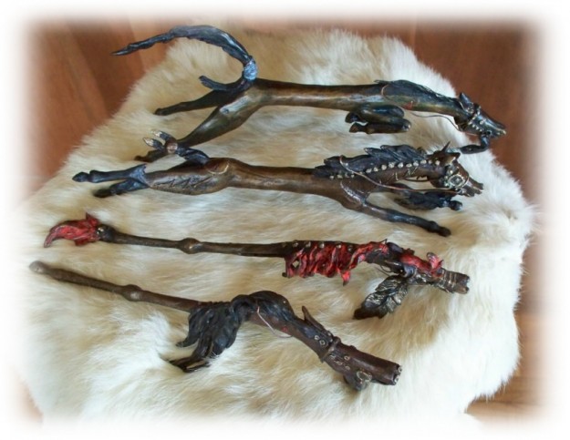 Bronze sculptures of scared Native American dance sticks.