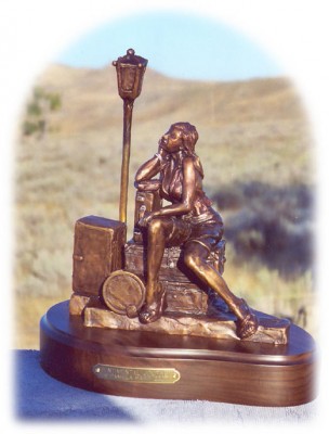 Bronze sculpture of young woman traveler.