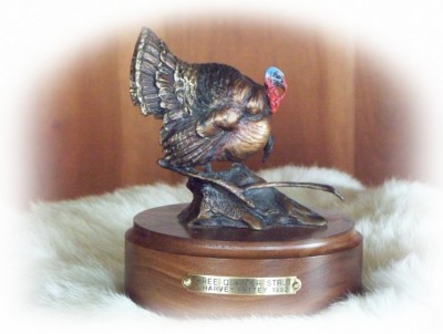 Bronze sculpture of a turkey.
