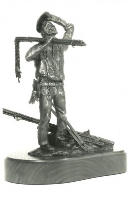 Bronze sculpture of an oil rig hand.