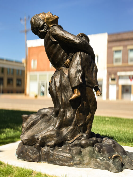 The Price - Narissa Whitman sculpture on GLendive Montana's Merrill Avenue