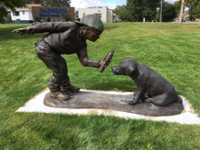 Born To Hunt - bronze sculpture of a boy and his puppy