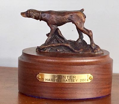 Bronze sculpture of dog pointing