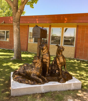 Bronze monument to the loyalty of a schoolboy's dog outside the DCHS building.