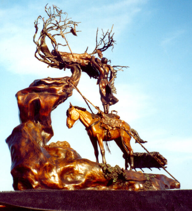 Bronze sculpture of a Native American burial site.