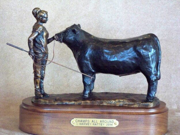  A young girl and her champion show steer.