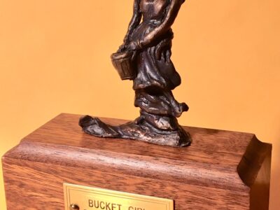 Bronze sculpture of a girl with a bucket