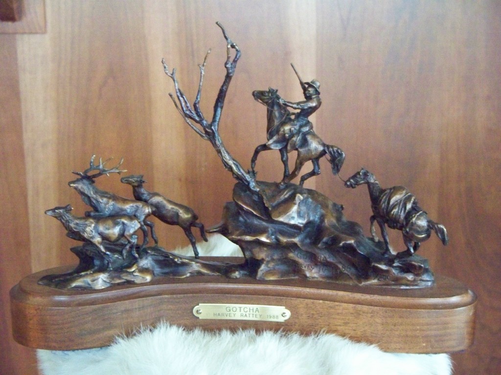 Bronze of an Elk hunter on horseback